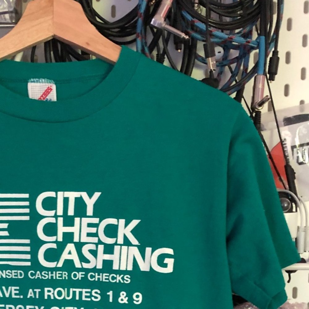 vintage jersey city local business shirt